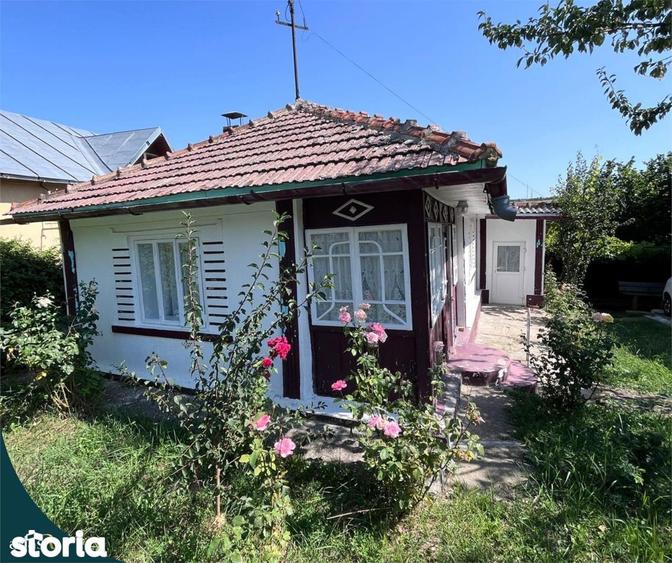 Teren intravilan - 1.248 mp + casa batraneasca 60 - 1