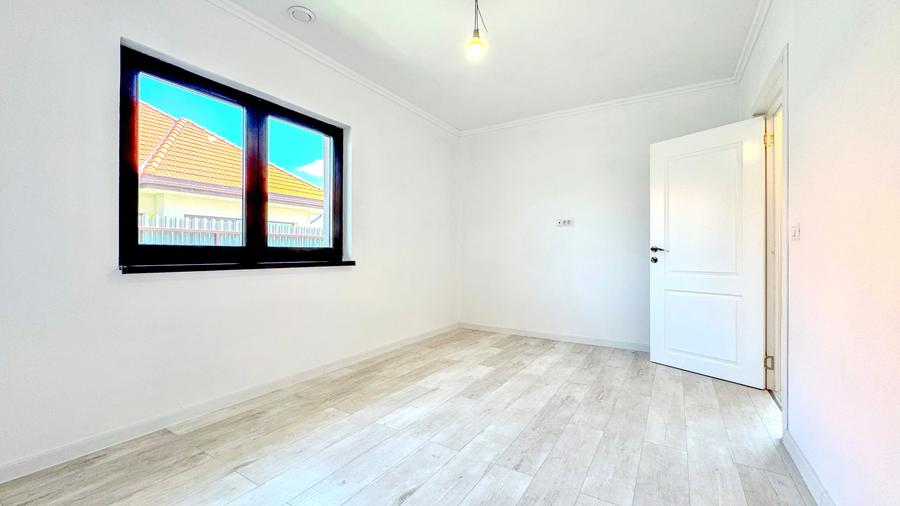 Casa eficienta energetic cu teren 500 mp in Harman - 16