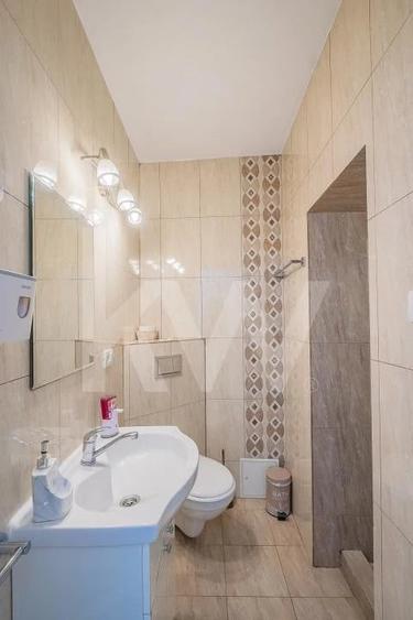 Apartament cu 3 camere semidecomandat în Central