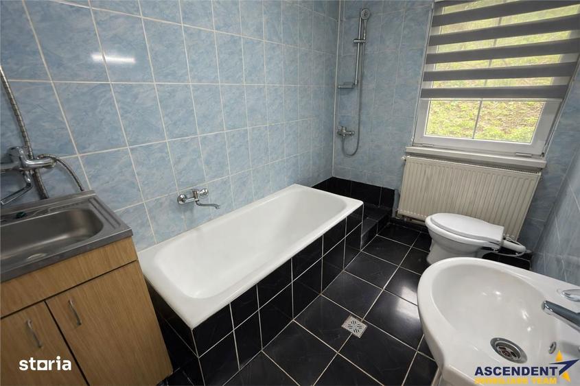 Casa cu 650 mp teren,zona linistita,curte verde,potential extindere,Gh - 1