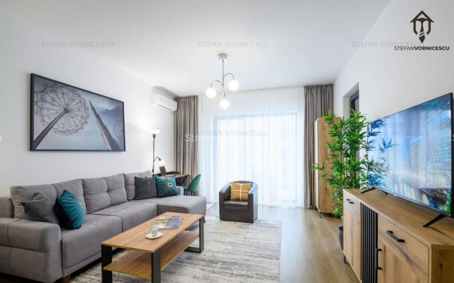 Prima Inchiriere: Apartament Modern ?i Confortabil cu 2 Ca Prima Inchiriere: Apartament Modern ?i Confortabil cu 2 Ca