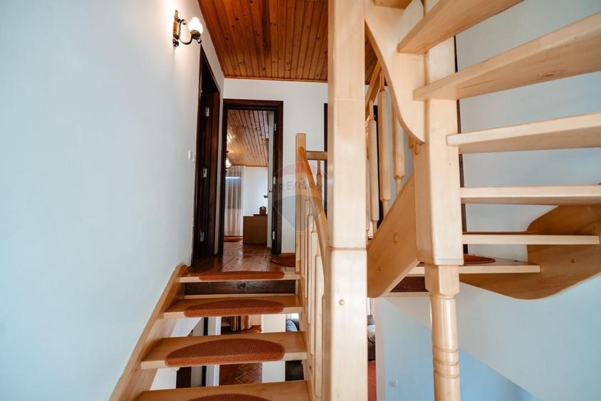 Vilă cu 6 camere, teren de 1000mp, într-un resort montan privat - 7