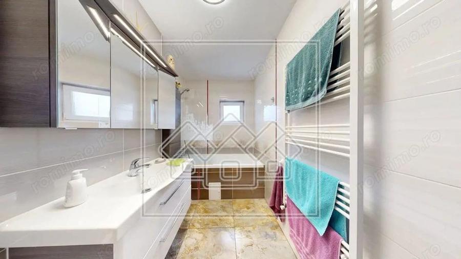 Ap.cu 3 camere, 2 bai si balcon, etaj intermediar, mobilat si utilat - 17