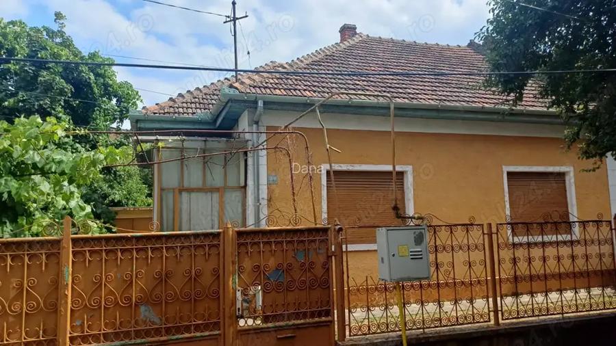 Casa individuala pe parter - 124 mp, 4 camere, anexe si garaj, teren 614 mp, -Str.Dr.I.Muresan