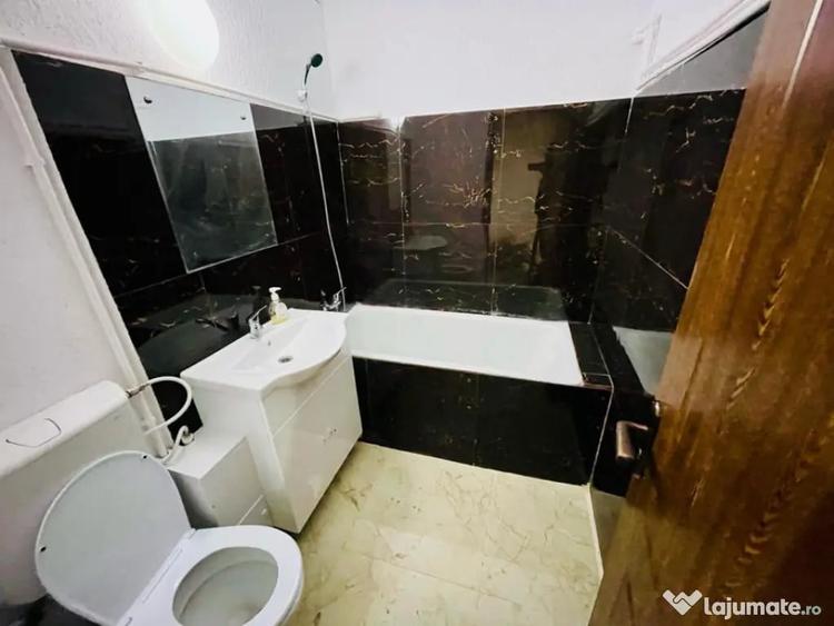 Apartament cu 3 camere semidecomandat în Nord