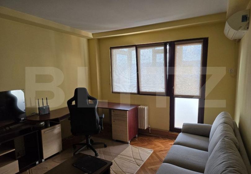 Apartament cu 2 camere semidecomandat, mobilat în Central