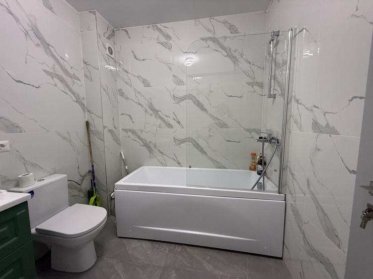 Apartament cu 2 camere semidecomandat, mobilat în Central