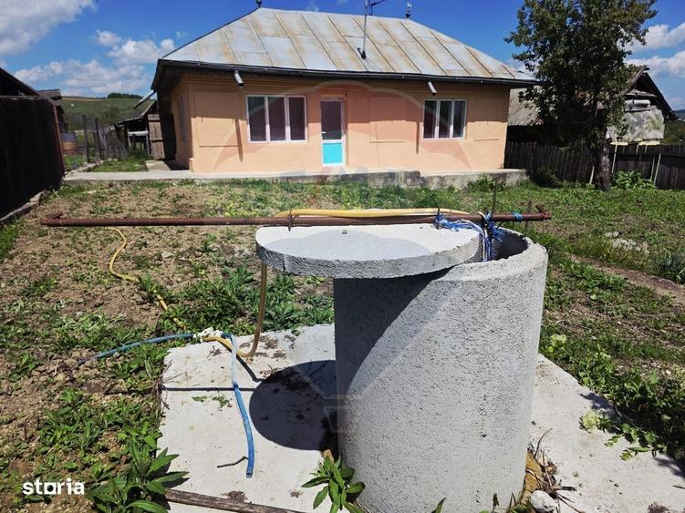 Casă cu 2 camere cu Teren 555 Mp în Botești