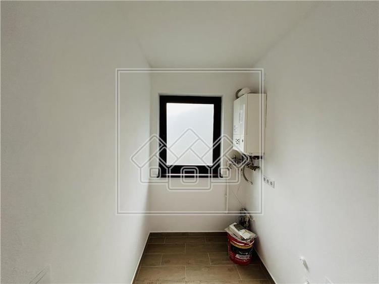 Casa de vanzare in Sibiu - 121 mp utili + 247 mp teren - 5