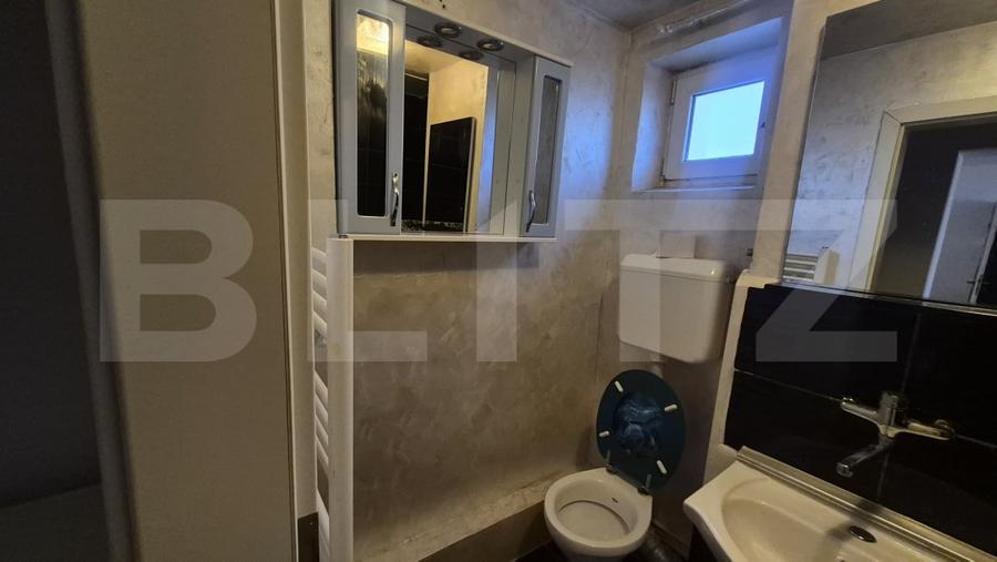 Apartament cu 2 camere semidecomandat, mobilat în Botizului