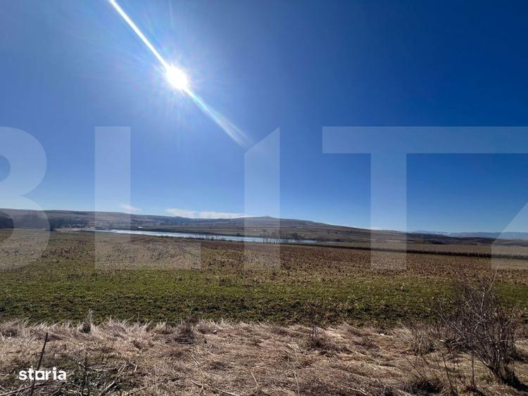 Oportunitate de Investitie: 1.5 Hectare langa Lac in Sutu, Comuna Ciur - 1