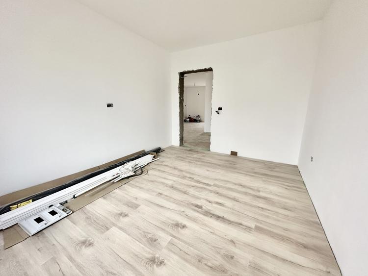 Duplex pe parter cu 3 camere - teren de 370 mp - Bucovat - 7