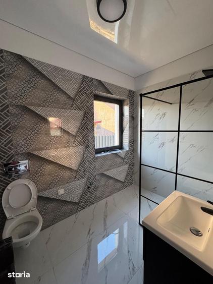 Apartament cu 4 camere în Bascov