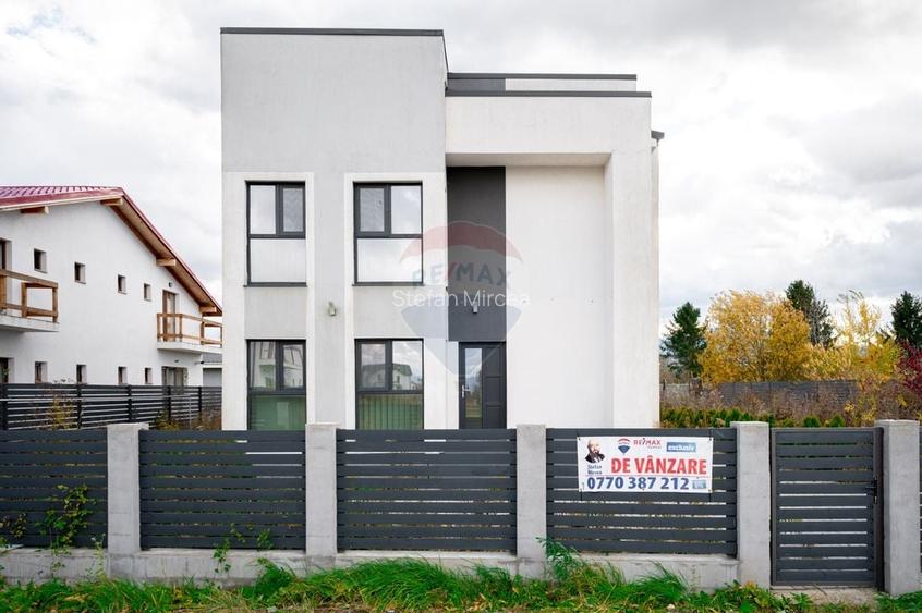 Casa noua in Stupini: 4 camere, 3 bai si teren generos de 600 mp
