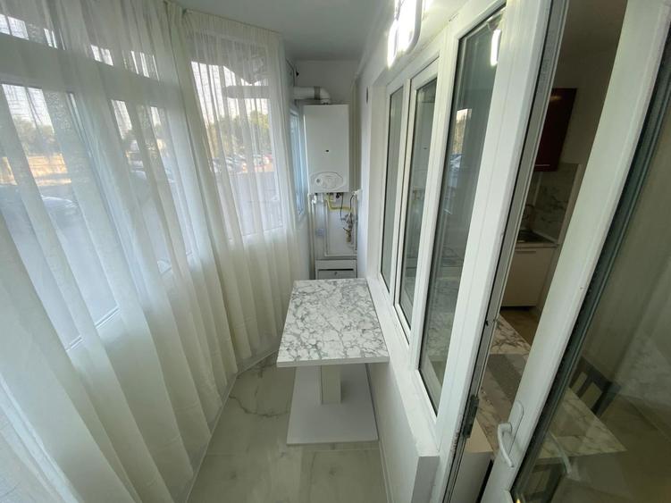Garsoniera de inchiriat cu 32mp la parter si este recent renovata - 7