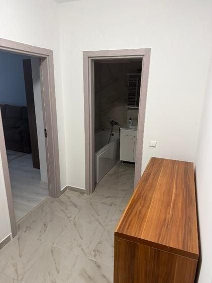 Garsoniera decomandata, centrala proprie, parcare inclusa, etaj 1 - 10