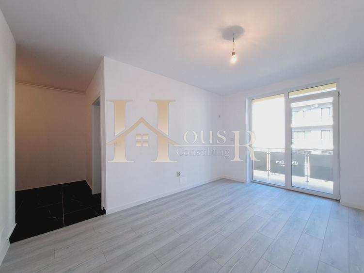 Etajul 1. Bucatarie inchisa. 35 mp utili. Decomandat. - 1