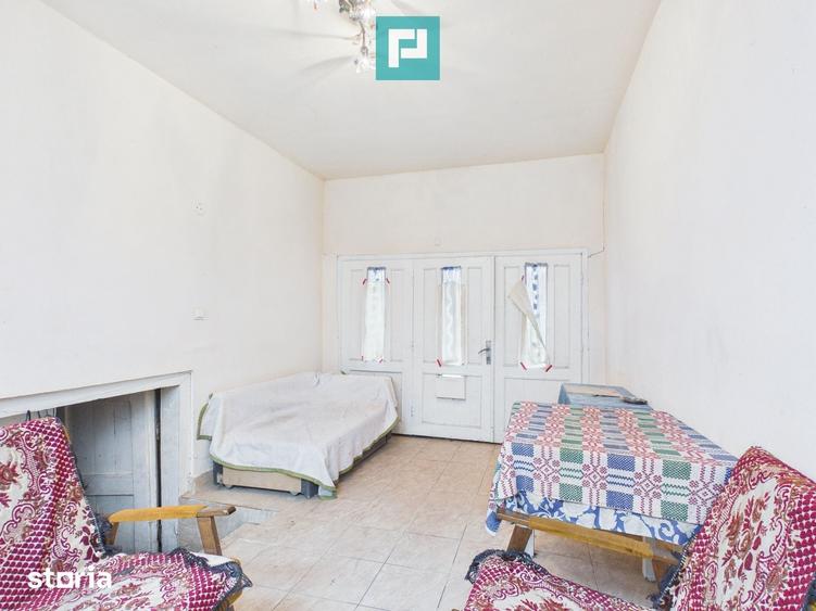 Casă cu 5 camere cu Teren 2837 Mp în Buteni