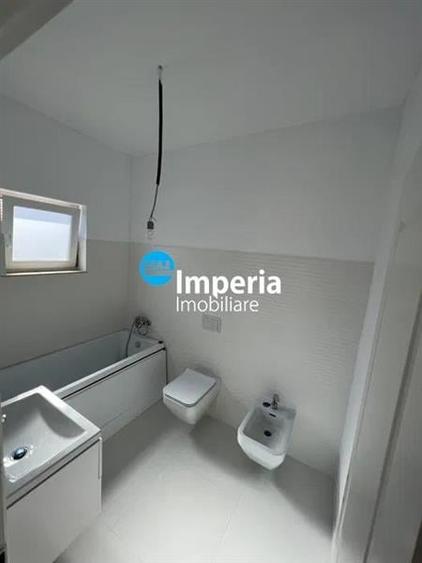Casă individuală cu 4 camere cu Teren 500 Mp în Bucium