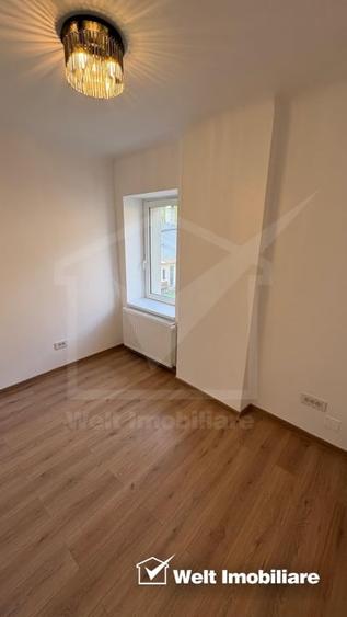 Apartament cu 3 camere semidecomandat în Central