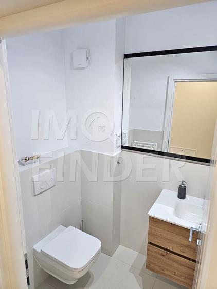 Apartament cu 3 camere semidecomandat, mobilat în Borhanci
