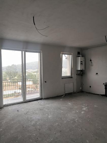 Apartament cu 2 camere decomandat în Gilău