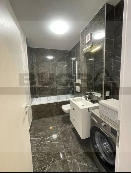 Apartament cu 2 camere semidecomandat în Chinteni