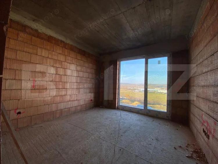 Casă cu Teren 560 Mp în Dezmir