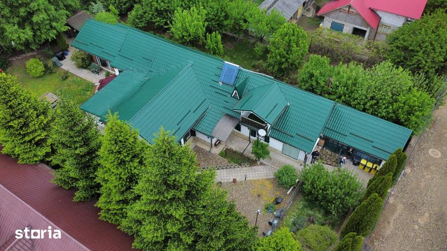 Casă cu 8 camere cu Teren 1000 Mp în Gârleni