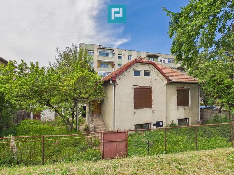 Casă cu 4 camere cu Teren 405 Mp în Romanilor