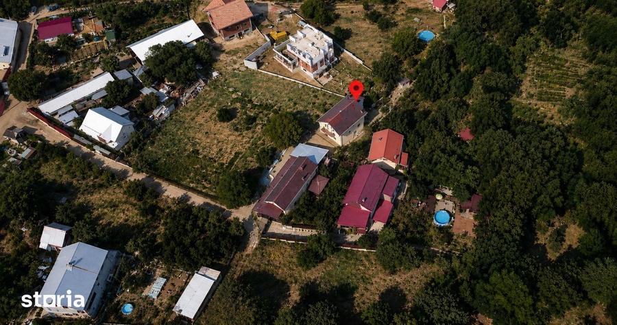 Casă cu 5 camere cu Teren 1000 Mp în Central