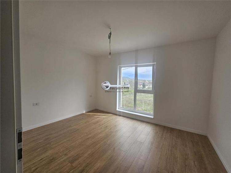 Apartament cu 3 camere decomandat în Bucium