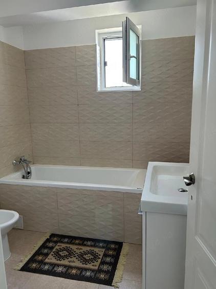 Apartament cu 3 camere decomandat în Bucium