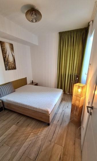 Apartament cu 2 camere semidecomandat, mobilat în Titan