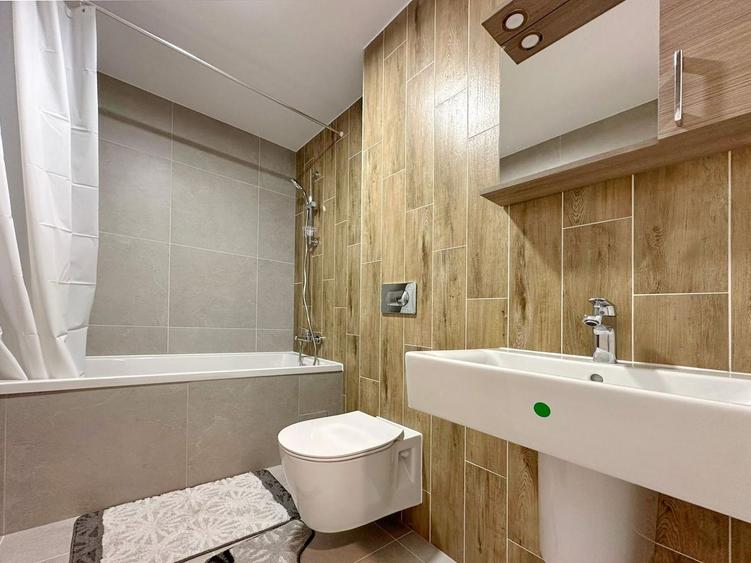 Apartament cu 3 camere decomandat, mobilat în Tractorul