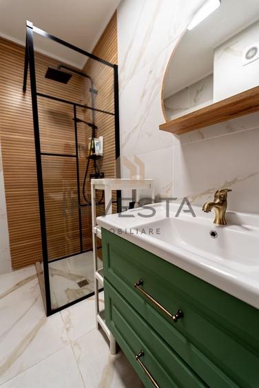 Apartament cu 3 camere semidecomandat, mobilat în Central