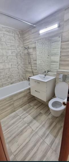 Apartament cu 2 camere semidecomandat, mobilat în Tei