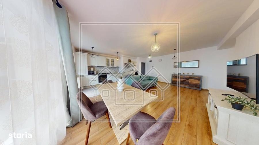 Apartament modern, cu 3 camere, balcon mare, loc de parcare inclus - C - 8