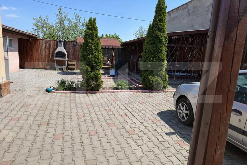 Casă individuală cu curte proprie amenajată și zonă de relaxare complet mobilata - 9