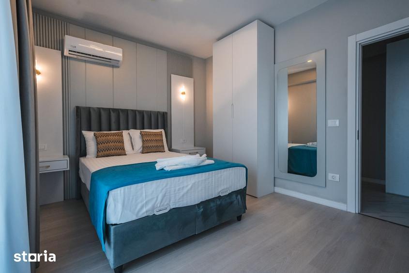 STUDIO CU DORMITOR SEPARAT - MOBILAT UTILAT LUX- SOLID SEA VIEW PERLA - 7