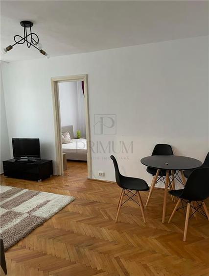 Apartament cu 2 camere semidecomandat, mobilat în Take Ionescu
