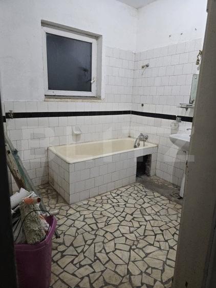 Casă individuală cu 4 camere decomandat cu Canalizare în Titulescu