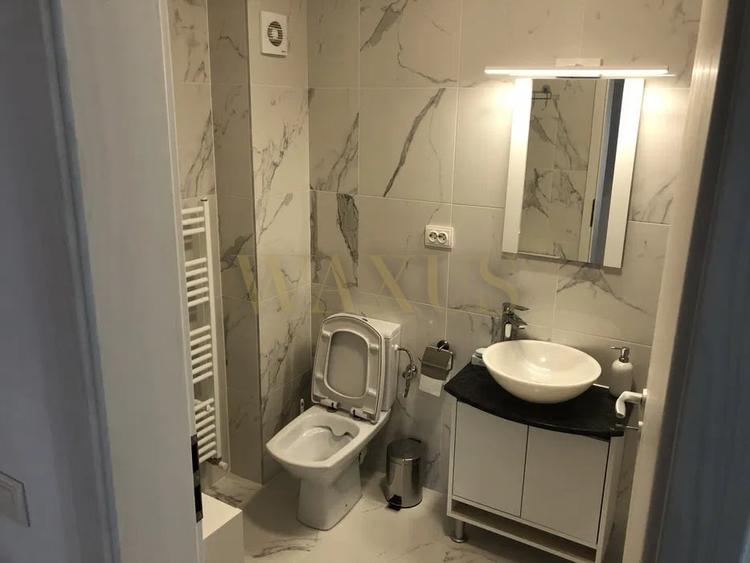 Apartament cu 2 camere semidecomandat, mobilat în Calea Moldovei
