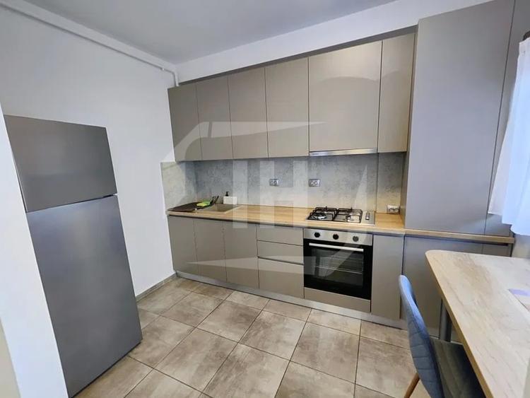 Apartament cu 2 camere semidecomandat, mobilat în Borhanci