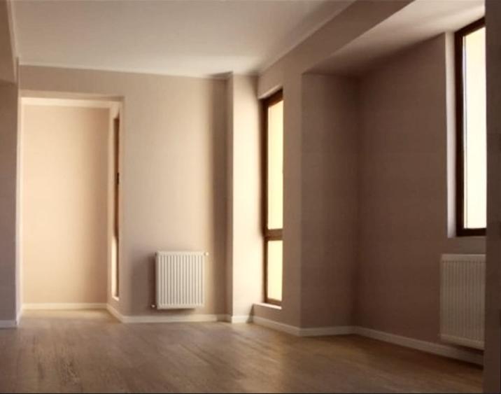 APARTAMENT FOARTE BINE COMPARTIMENTAT IN IMOBIL NOU CU GARAJ - DACIA - LASCAR - 7