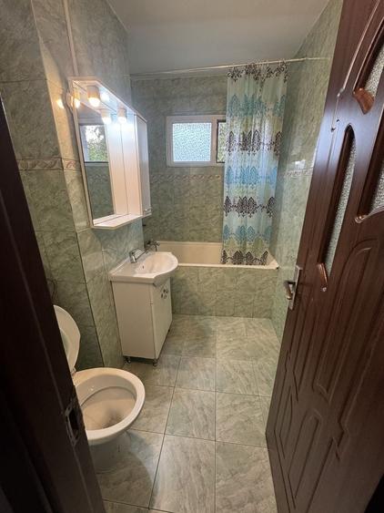Apartament cu 2 camere semidecomandat în Podu Roș