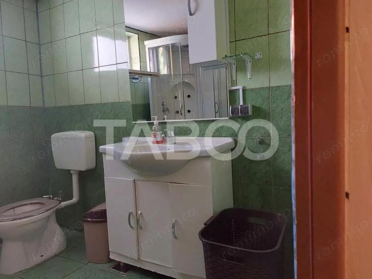 Casa 214 mp utili singur in curte 800 mp teren zona centrala Cisnadie - 14