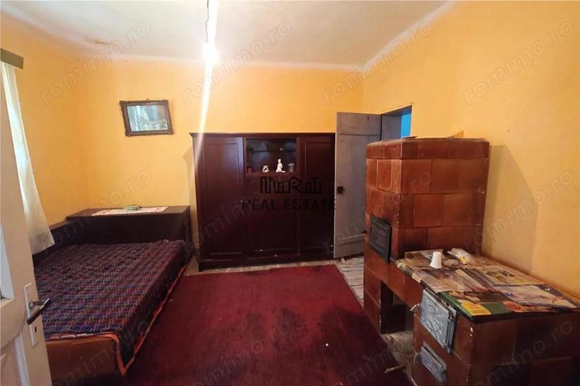 Teren generos si casa din caramida in satul istoric Tebea - 14