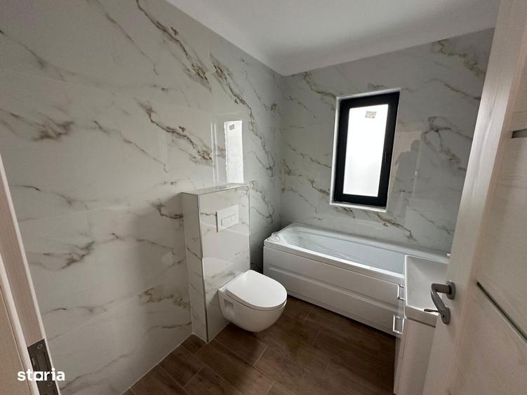 Casa pe parter cu incalzire in pardoseala si tripan - 6