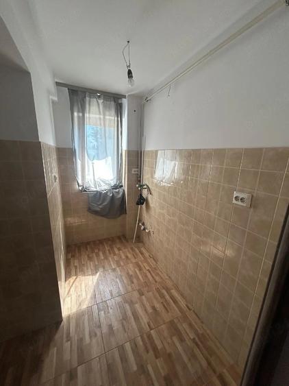 Apartament cu 3 camere nedecomandat în Mogoșoaia